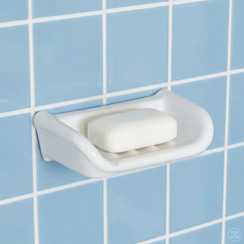 Small white porcelain bathroom soap dish with sides