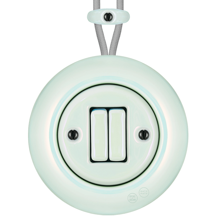 PORCELAIN KATY PATY COLONA ROUND SURFACE MOUNTED DOUBLE SLIM BUTTON SWITCH CONCHA - DYKE & DEAN