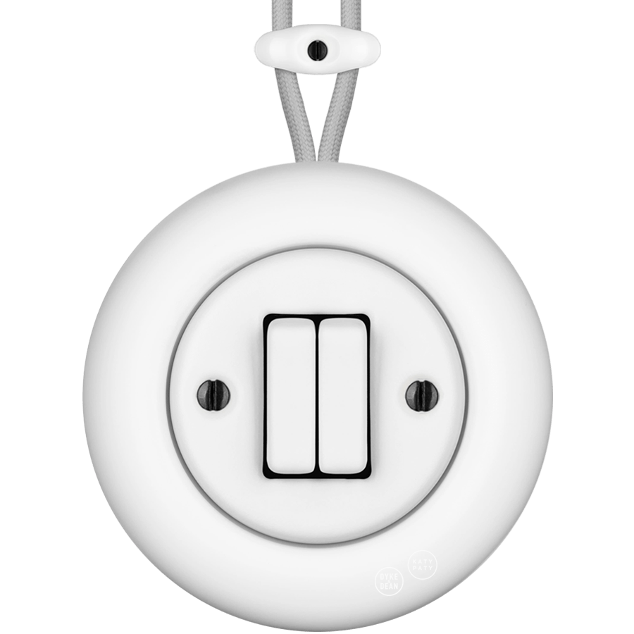 PORCELAIN KATY PATY COLONA ROUND SURFACE MOUNTED DOUBLE SLIM BUTTON SWITCH MATTE WHITE - DYKE & DEAN