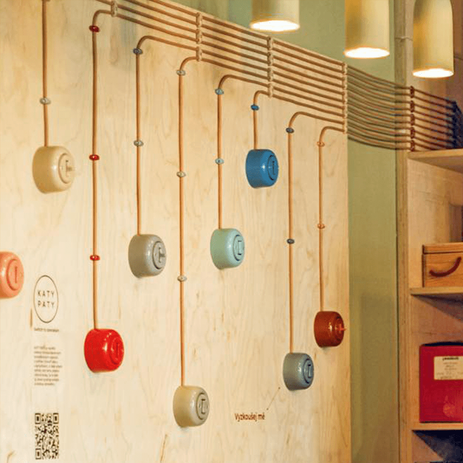 PORCELAIN KATY PATY COLONA ROUND SURFACE MOUNTED DOUBLE TOGGLE BUTTON SWITCH BRICK RED - DYKE & DEAN