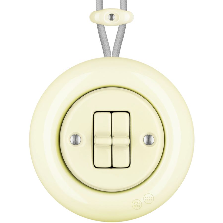 PORCELAIN KATY PATY COLONA ROUND SURFACE MOUNTED DOUBLE TOGGLE BUTTON SWITCH VANILLA - DYKE & DEAN