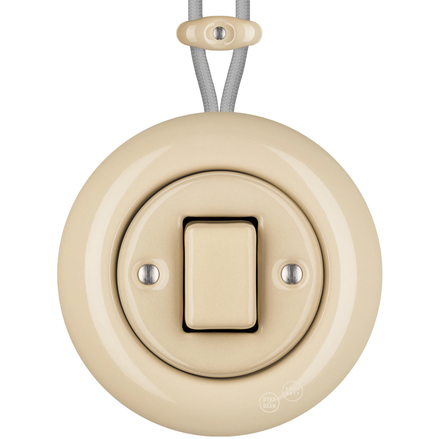 PORCELAIN KATY PATY COLONA ROUND SURFACE MOUNTED FAT BUTTON SWITCH SAND - DYKE & DEAN