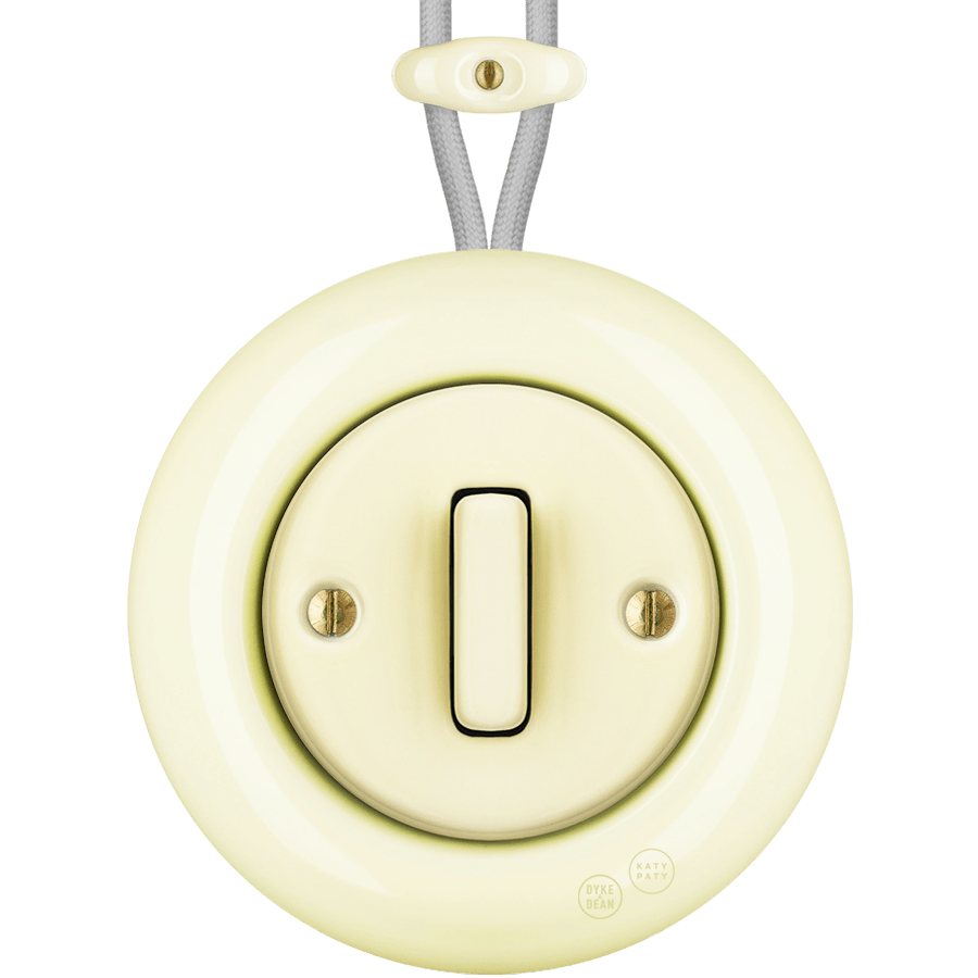 PORCELAIN KATY PATY COLONA ROUND SURFACE MOUNTED SLIM BUTTON SWITCH VANILLA - DYKE & DEAN