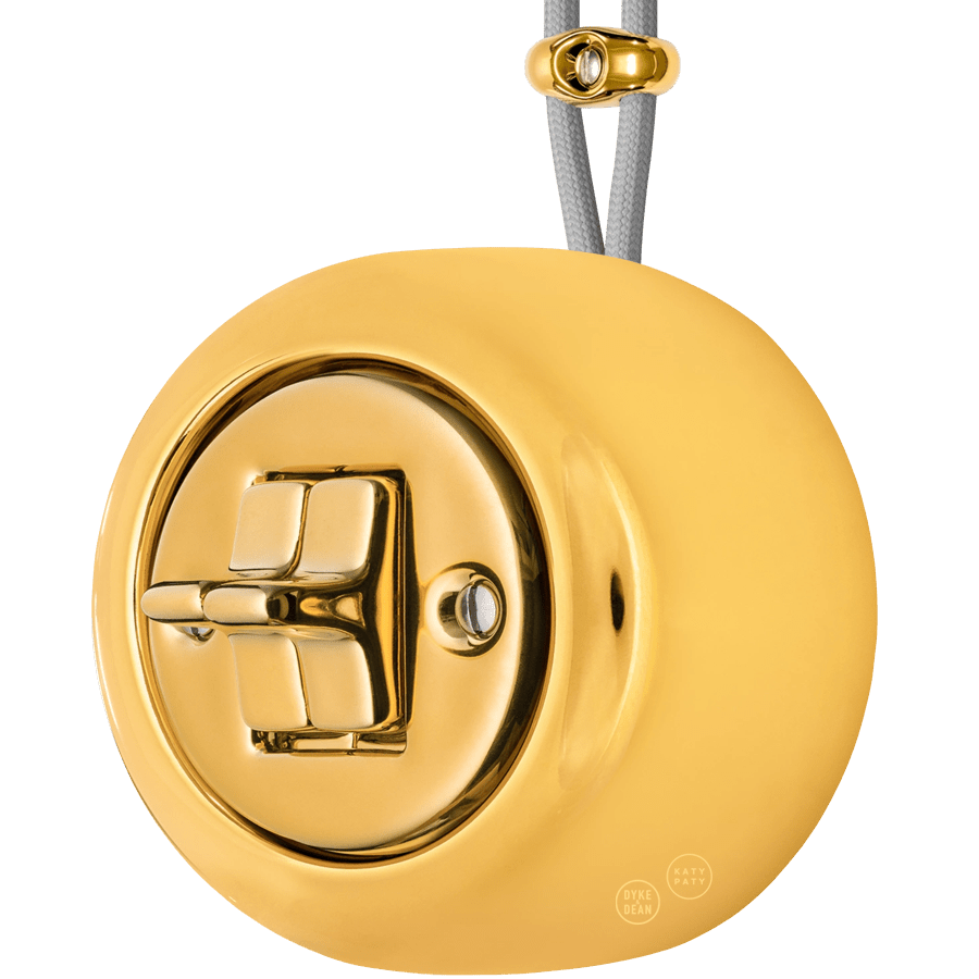 PORCELAIN ROUND SURFACE MOUNTED DOUBLE TOGGLE BUTTON SWITCH GOLD - DYKE & DEAN