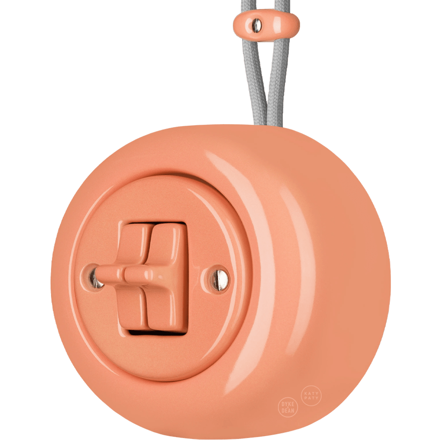 PORCELAIN ROUND SURFACE MOUNTED DOUBLE TOGGLE BUTTON SWITCH SALMON PINK - DYKE & DEAN