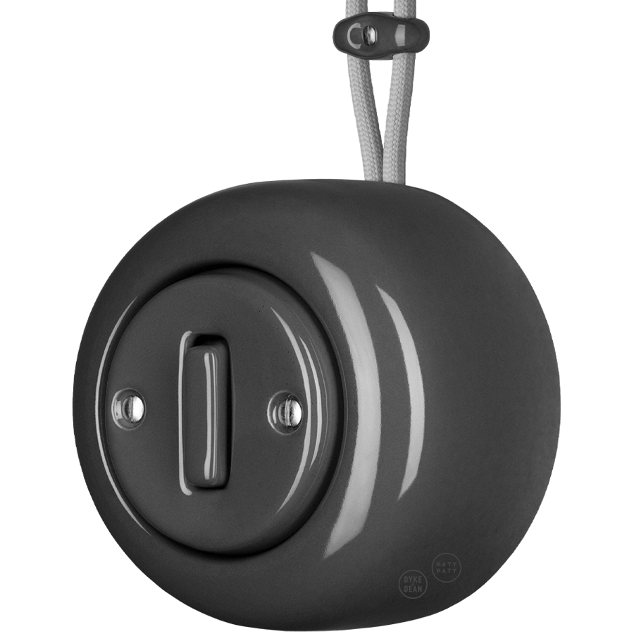 PORCELAIN ROUND SURFACE MOUNTED SLIM BUTTON SWITCH DARK GREY - DYKE & DEAN