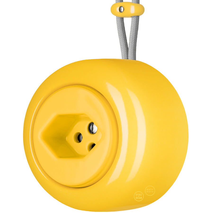 PORCELAIN ROUND SURFACE MOUNTED SWISS SOCKET YELLOW - DYKE & DEAN