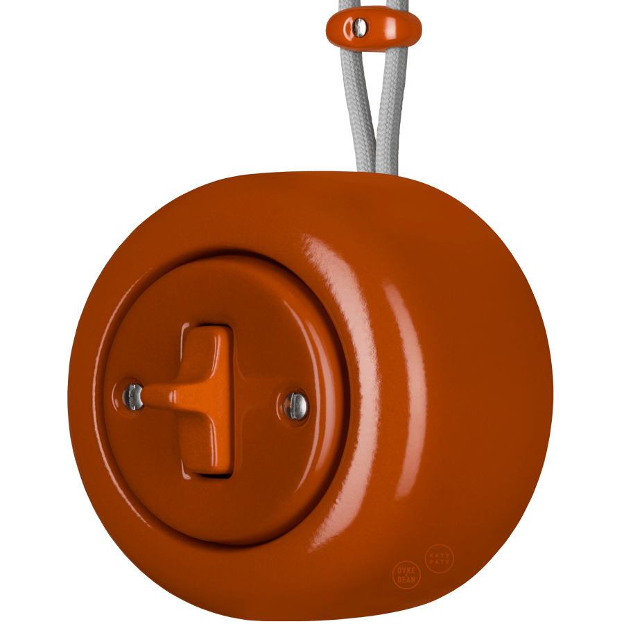 PORCELAIN ROUND SURFACE MOUNTED TOGGLE BUTTON SWITCH BRICK RED - DYKE & DEAN